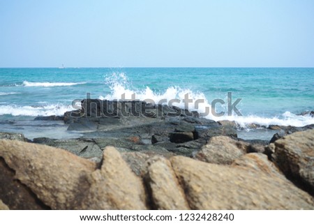 
Sea waves, rocks, water, scattered