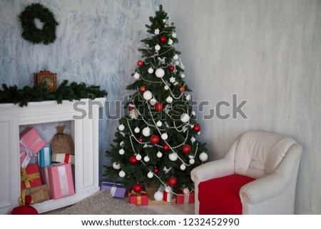Christmas tree with presents on new year's Eve in the Interior