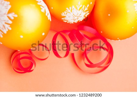 christmas decoration toys on orange background