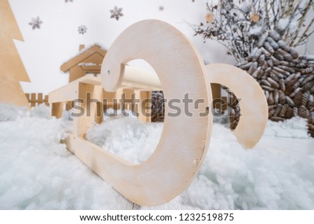decorations made of cardboard, houses and sleds. new year photo zone