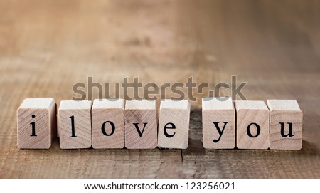 Message I love you spelled in wooden blocks with copy space