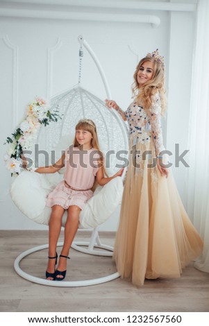 girls on the swing in the studio