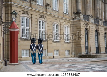 Guards at Amalienborg Castle. Home of the Royal family. Copenhagen. Denmark