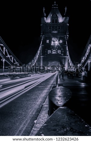 Tower Bridge, London. Slow exposure/ shutter speed image. Trail lights.