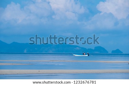 A small fishing boating the sea  with beautiful blue sky in suuny day Samui Thailand
