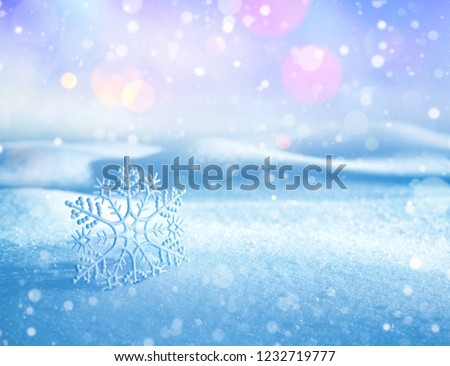 Christmas background with  decorative snowflake on brilliant snow. Winter background for cards.