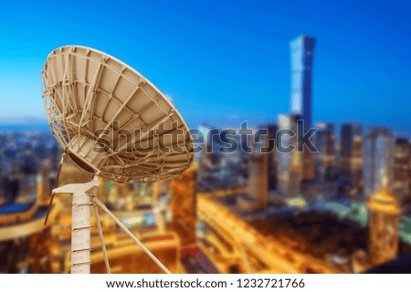 Satellite antenna in the tall buildings of the city