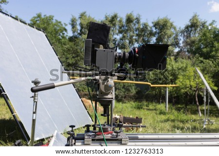 Photo of the process of shooting the film. This action is performed in nature.
