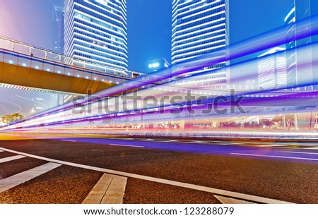 the light trails on the modern building background in shanghai china