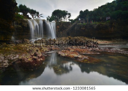 The beauty of the sea waterfall on the coast of Jogan Indonesia.