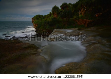 The beauty of the sea waterfall on the coast of Jogan Indonesia.