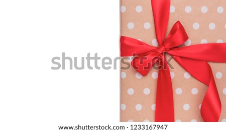 Gift box. Wrapping paper with polka dots. Preparation for the holidays.