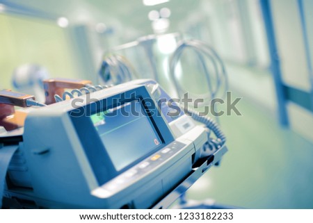 Medical monitor with the flatline on it as a concept of a patient clinical death. Royalty-Free Stock Photo #1233182233