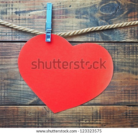red heart made of paper with a place for text greetings