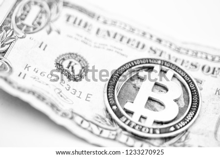 blurred crumpled dollar money and different bitcoin background like concept of problem and future
