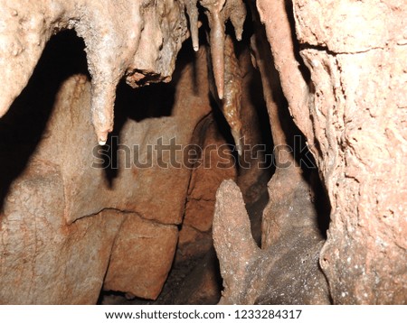  Stalactites and stalagmites in a cave