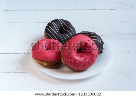 sweet Donuts for tea. chocolate Donuts. Cherry donut.