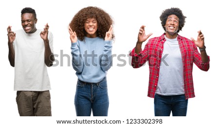 Collage of african american group of people over isolated background smiling crossing fingers with hope and eyes closed. Luck and superstitious concept.