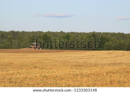Russian field with tractor