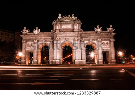 Long exposure night view of Puerta de Alcalá (Alcala Gate) in Madrid
