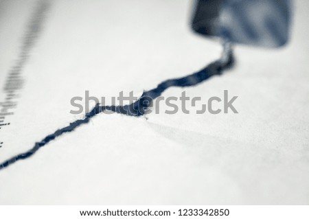 Ripped paper texture macro against white background