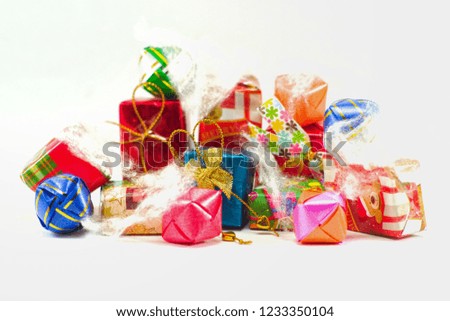 Selective focus picture of gift boxes wrapped by colorful paper for Christmas festival with isolated background.Closeup pile of present boxes in colorful package for special events like birthday party
