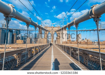 NEW YORK, UNITED STATES - DECEMBER 21, 2009: Brooklyn Bridge across East River in New York City, United States of America.