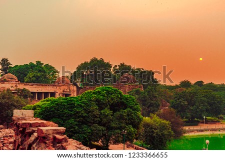 View of the landmark Medieval era Hauz Khas Complex, a medieval village complex with lake that is now a tourist attraction in Delhi, India. Royalty-Free Stock Photo #1233366655