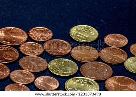  many euro cent coins for black background