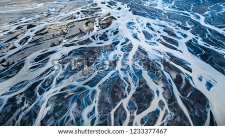 Drone view of an Icelandic riverbed Royalty-Free Stock Photo #1233377467
