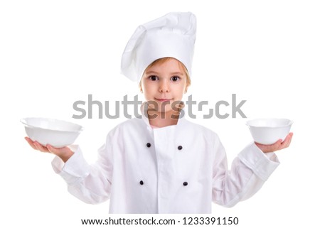 Cheerful girl chef white uniform isolated on white background. Holding two white drinking bowls in both hands. Landscape image