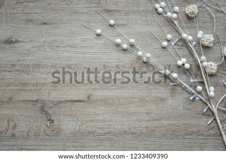Christmas wooden background - textured wooden board with Christmas garland and free text space