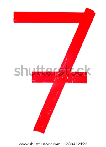 Numeral 7 symbol made of red tape pieces, isolated on the white background