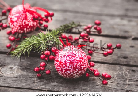 Red Christmas ball decoration on rustic wood background