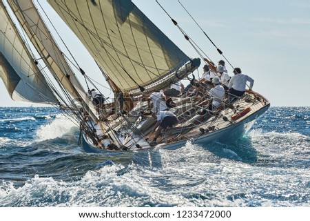 Sport sailing yachts in the race Royalty-Free Stock Photo #1233472000
