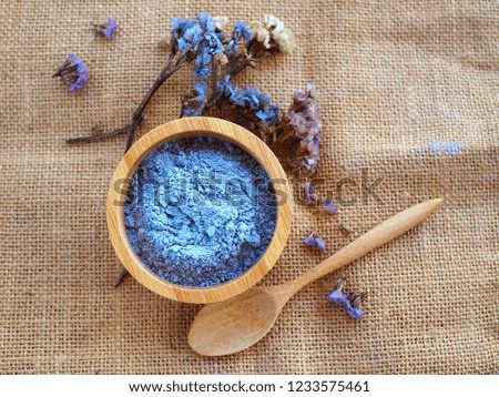 Charcoal powder prepare in wooden cup for face mask