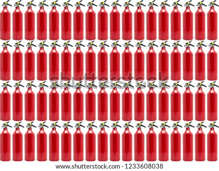 Pattern made from small, manual fire extinguisher, isolated on a white background with a clipping path.