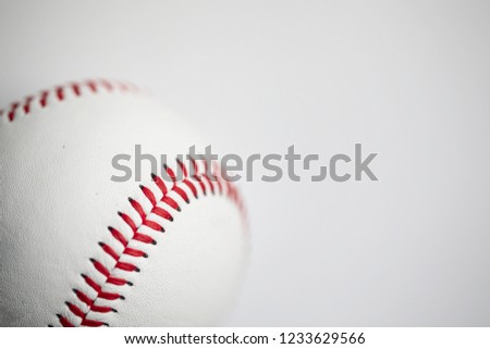 White baseball on a plain white background