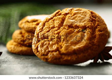 Traditional homemade spicy cookies served on a wooden table.