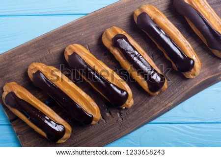 French dessert eclair with chocolate .