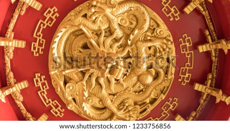 Red dragon gold relief decoration