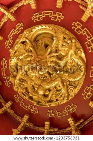 Red dragon gold relief decoration