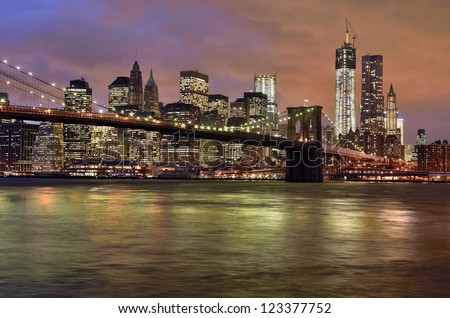 New York City - Brooklyn Bridge with Manhattan skyline at night, USA