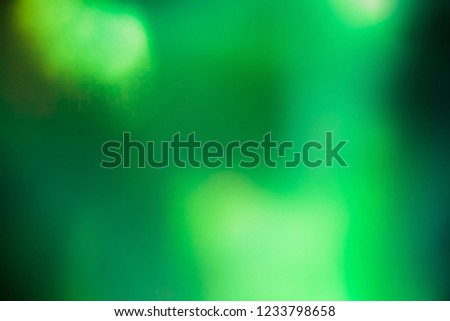 Abstract glowing light on a fresh green background