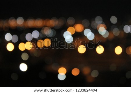 Night city street lights bokeh background.