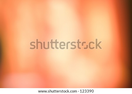 Beautiful abstract background in orange and peach colors of light.