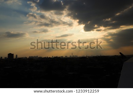 Picture of Panorama ,Building ,sky with light a sunsets sun ray  in Bangkok,Thailand on New year day 1st January