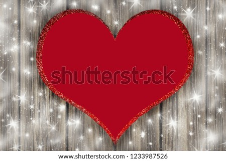 Christmas heart and wooden background