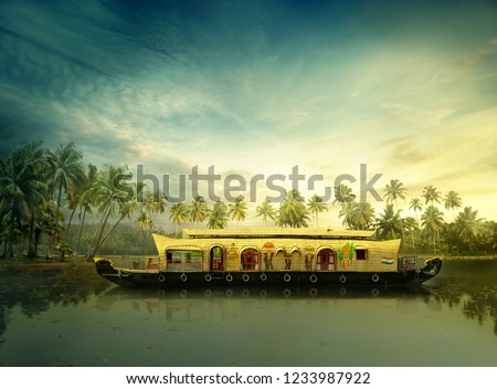 KERALA BOAT HOUSE INDIA TOURISM Kerala's Backwaters India Royalty-Free Stock Photo #1233987922