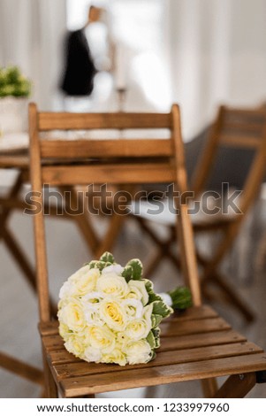 wedding bouquet on the background of the silhouettes of lovers